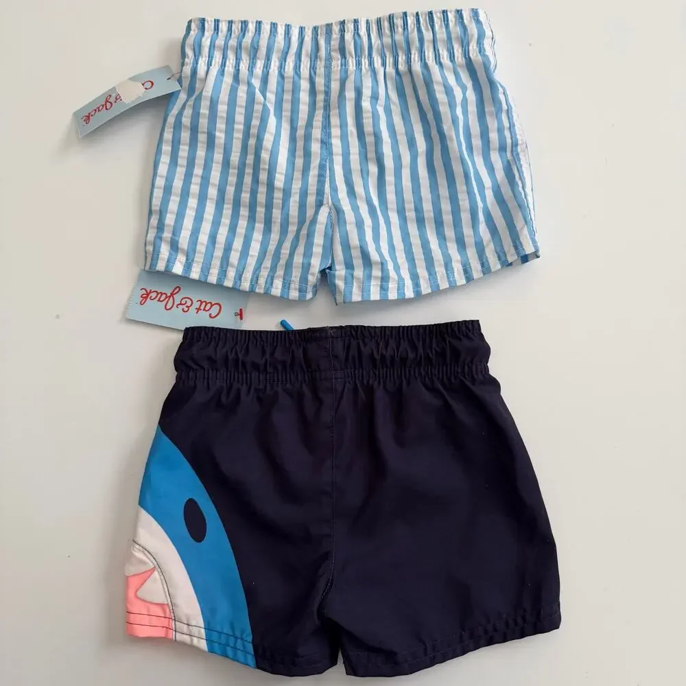 2x Cat & Jack swim trunks navy blue shark light blue and white vertical stripe